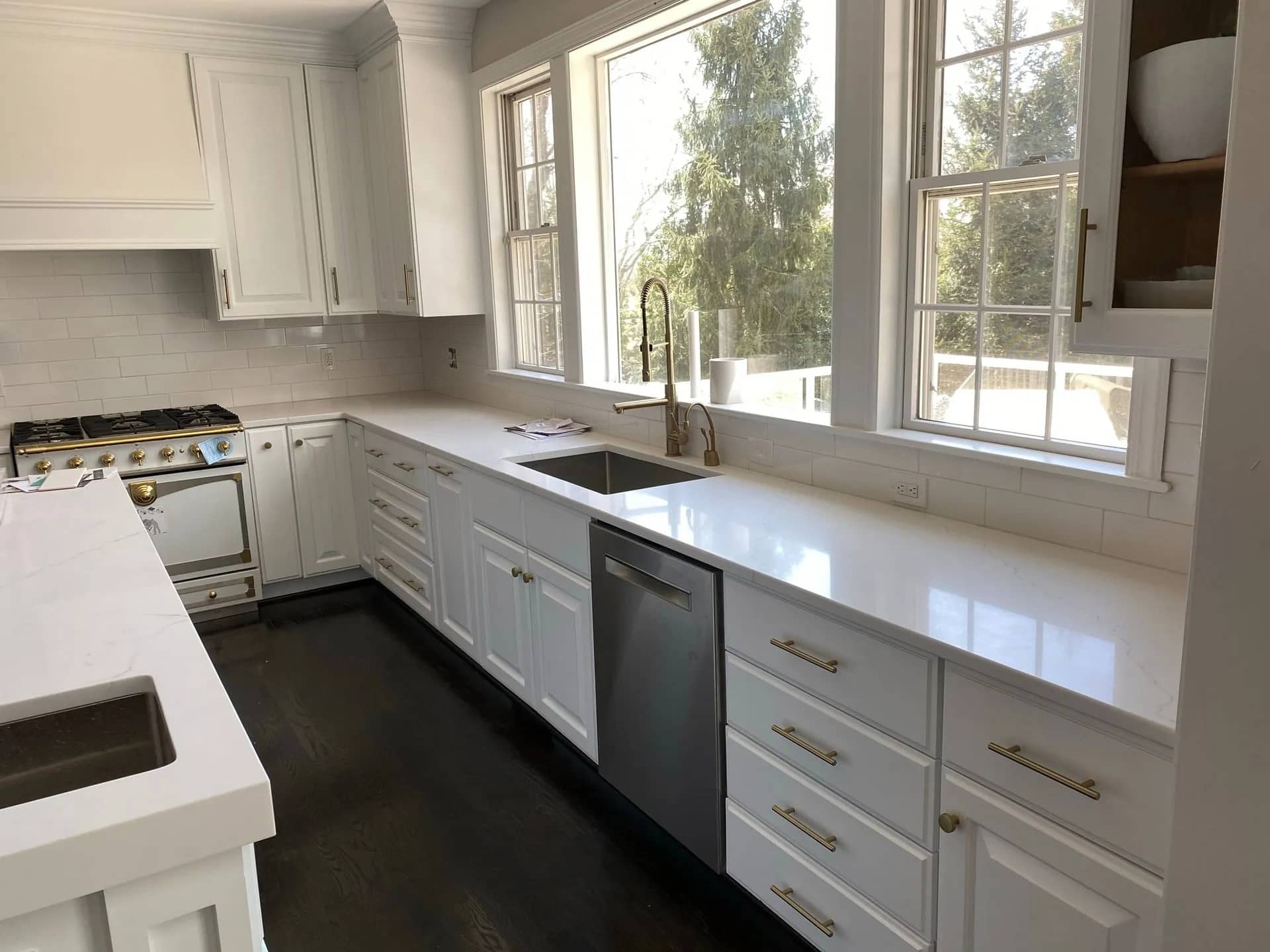 White & Brass Kitchen - Kitchen Remodel project by Emperor Renovations in Philadelphia
